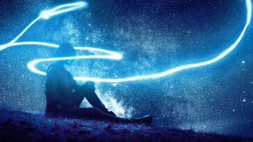 person seated on grass