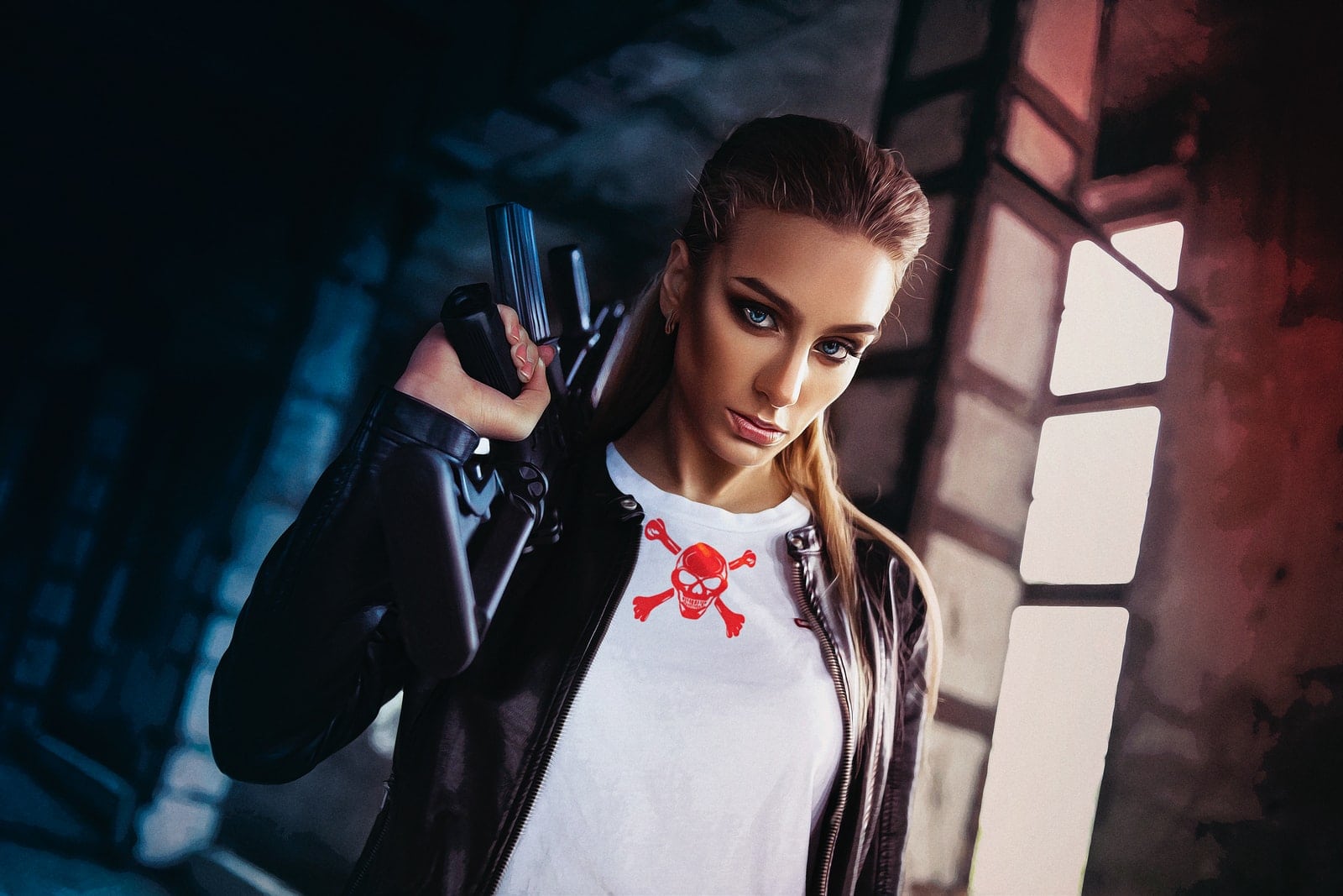 woman in white and red floral shirt and black leather jacket holding black smartphone