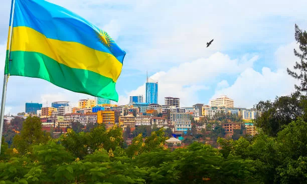 View of Kigali business district with offices, towers and residential homes, and Rwanda's flag