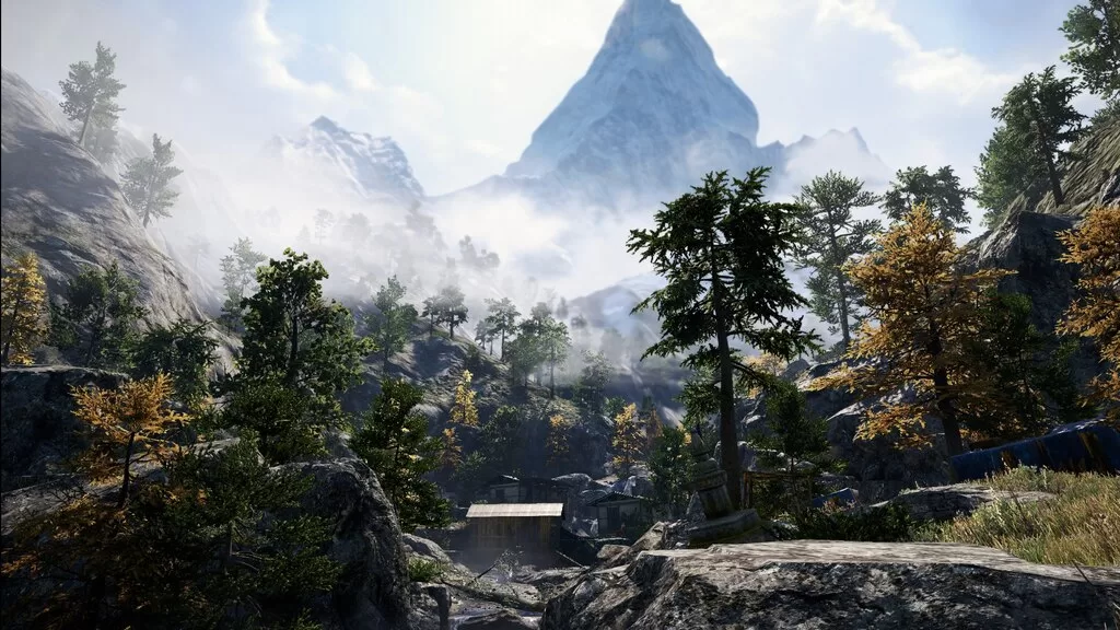 Горный поселок среди лесов и заснеженных вершин в Far Cry 4